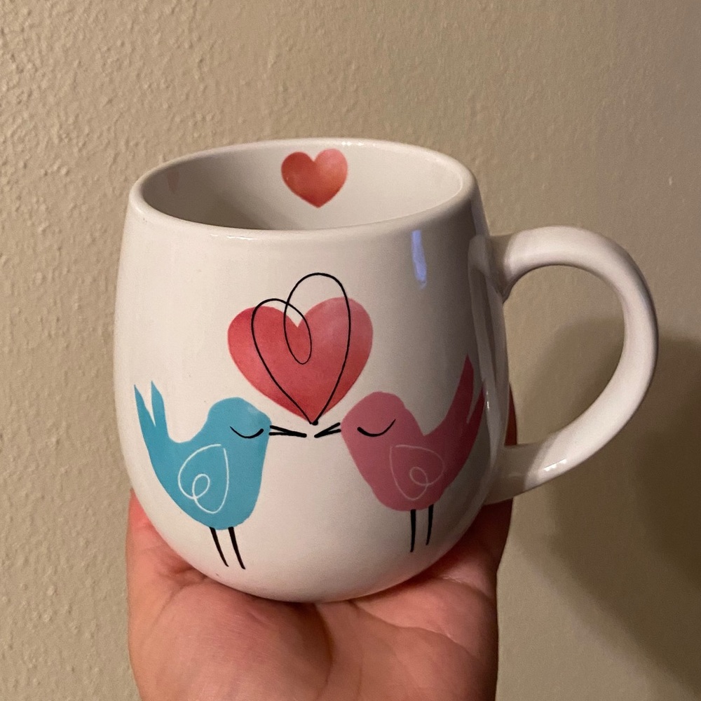 Love birds mug with a heart inside the mug